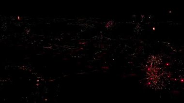 Fireworks Display At Night During New Year's Eve In A Town In Iceland. wide aerial