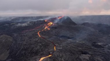 Panorama Of A Golden Lava River Flowing Down The Volcano. aerial