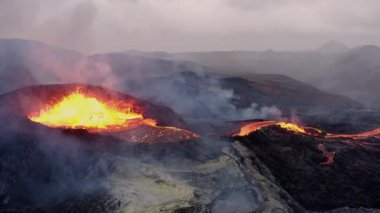 Volcanic Eruption With Lava Fountain And Lava River - aerial drone shot