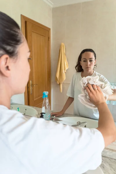 Young Woman Cleaning Mirror Bathroom Real People Hygiene Concept Generation — Stockfoto