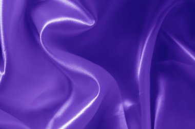 Proton mor kumaşının dokusu dalga ve omuz silkiyor. Parlak kumaş.