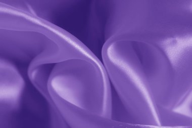 Proton mor kumaşının dokusu dalga ve omuz silkiyor. Parlak kumaş.
