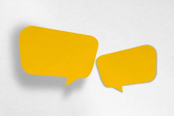 Speech Balloon Shaped Yellow Paper Isolated White Background Communication Bubbles — Foto Stock