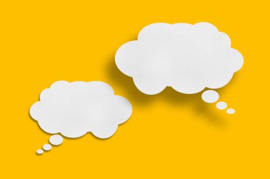 white cloud paper speech bubble shape against yellow background design