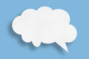 white cloud paper speech bubble shape against blue background design.