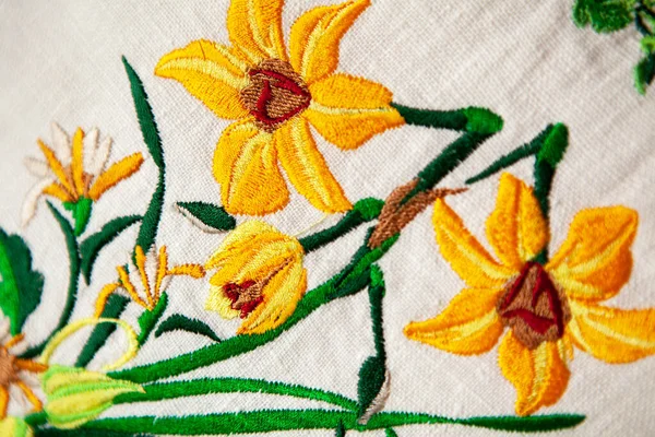 Colorful embroidery design on white linen pillow. — Stock Photo, Image