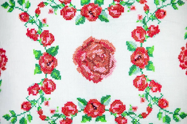 Cross-stitch embroidery in the form of roses . — Stock Photo, Image