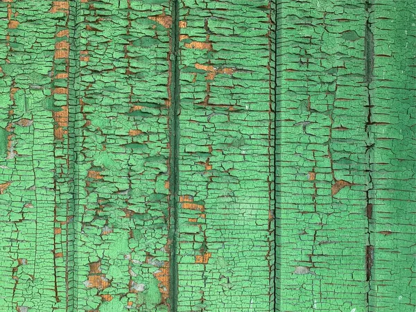 Yıpranmış Boya Desenli Ahşap Bir Duvar — Stok fotoğraf