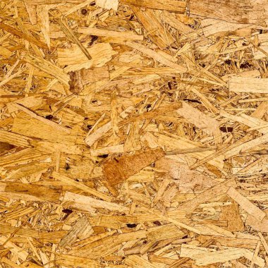 Sıkıştırılmış yonga arka planı. Ahşap zemin. OSB dokusu