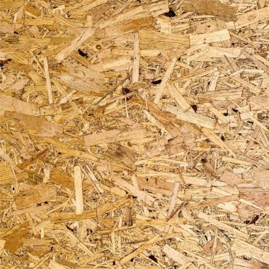 Sıkıştırılmış yonga arka planı. Ahşap zemin. OSB dokusu