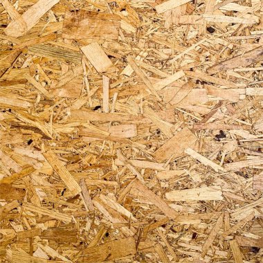 Sıkıştırılmış yonga arka planı. Ahşap zemin. OSB dokusu