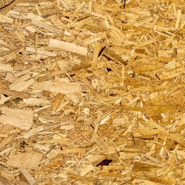 Sıkıştırılmış yonga arka planı. Ahşap zemin. OSB dokusu