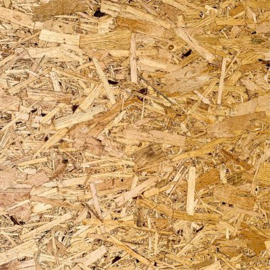 Sıkıştırılmış yonga arka planı. Ahşap zemin. OSB dokusu