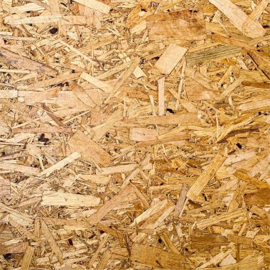 Sıkıştırılmış yonga arka planı. Ahşap zemin. OSB dokusu