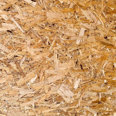 Sıkıştırılmış yonga arka planı. Ahşap zemin. OSB dokusu