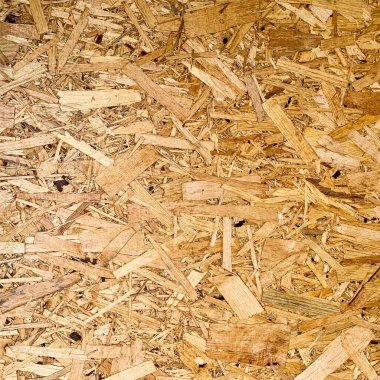 Sıkıştırılmış yonga arka planı. Ahşap zemin. OSB dokusu