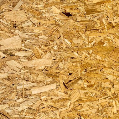 Sıkıştırılmış yonga arka planı. Ahşap zemin. OSB dokusu