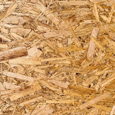 Sıkıştırılmış yonga arka planı. Ahşap zemin. OSB dokusu