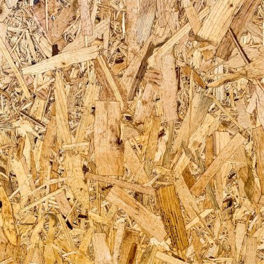 Sıkıştırılmış yonga arka planı. Ahşap zemin. OSB dokusu