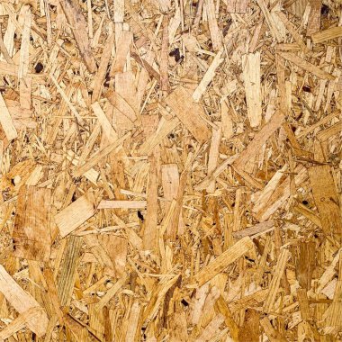 Sıkıştırılmış yonga arka planı. Ahşap zemin. OSB dokusu