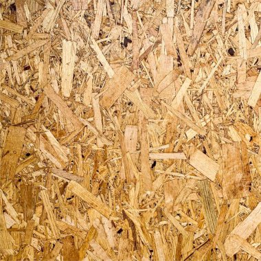 Sıkıştırılmış yonga arka planı. Ahşap zemin. OSB dokusu