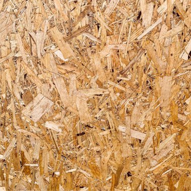 Sıkıştırılmış yonga arka planı. Ahşap zemin. OSB dokusu