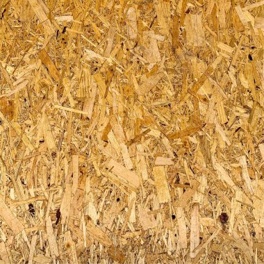 Sıkıştırılmış yonga arka planı. Ahşap zemin. OSB dokusu