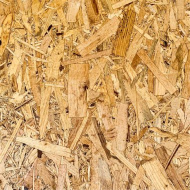 Sıkıştırılmış yonga arka planı. Ahşap zemin. OSB dokusu