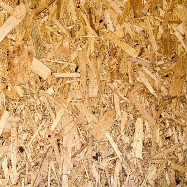 Sıkıştırılmış yonga arka planı. Ahşap zemin. OSB dokusu