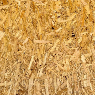 Sıkıştırılmış yonga arka planı. Ahşap zemin. OSB dokusu