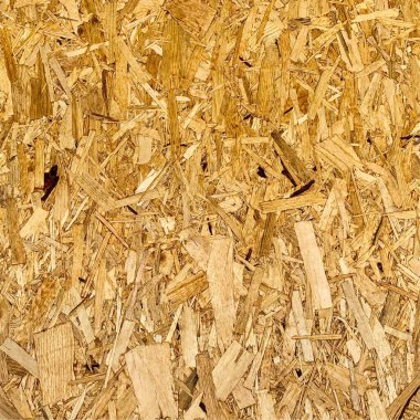 Sıkıştırılmış yonga arka planı. Ahşap zemin. OSB dokusu