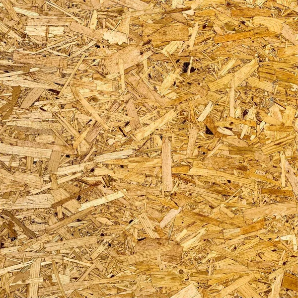 Sıkıştırılmış yonga arka planı. Ahşap zemin. OSB dokusu