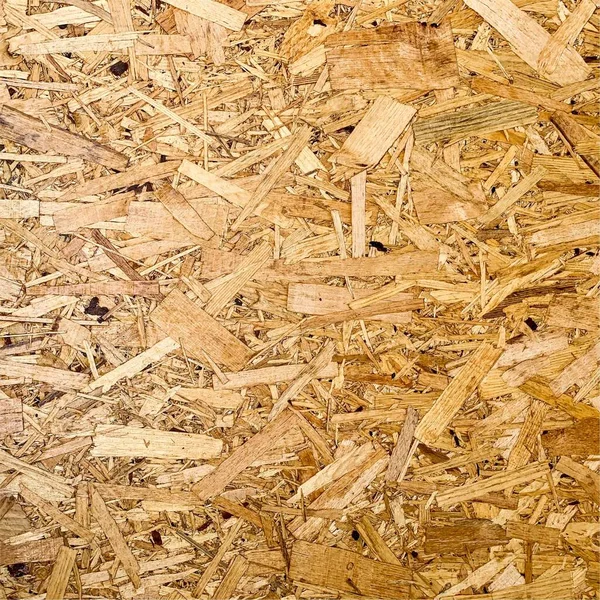 Sıkıştırılmış yonga arka planı. Ahşap zemin. OSB dokusu