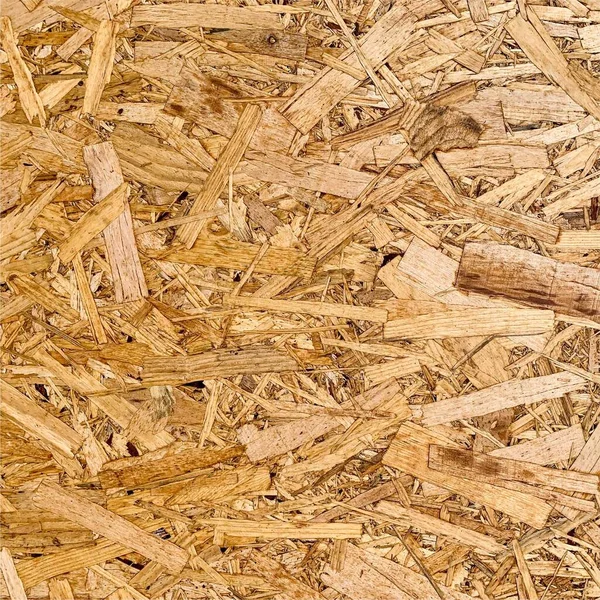 Sıkıştırılmış yonga arka planı. Ahşap zemin. OSB dokusu