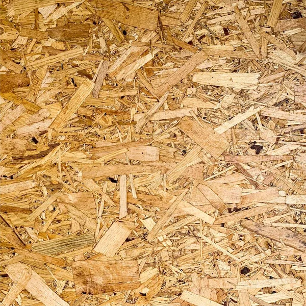 Sıkıştırılmış yonga arka planı. Ahşap zemin. OSB dokusu
