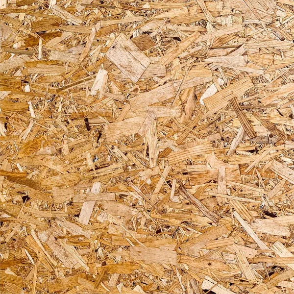 Sıkıştırılmış yonga arka planı. Ahşap zemin. OSB dokusu