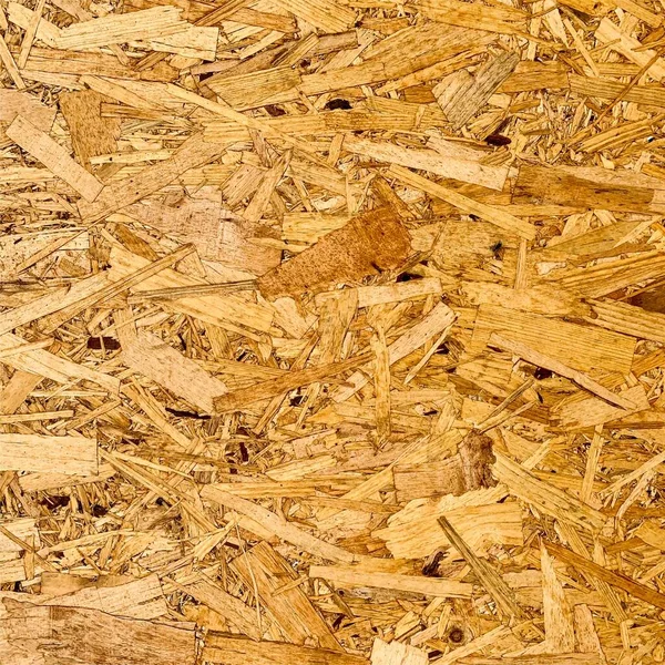 Sıkıştırılmış yonga arka planı. Ahşap zemin. OSB dokusu