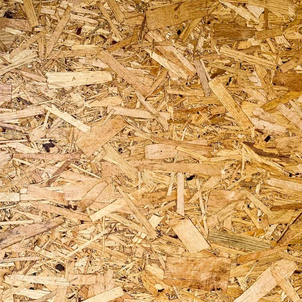 Sıkıştırılmış yonga arka planı. Ahşap zemin. OSB dokusu