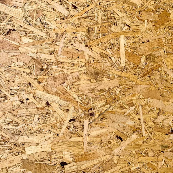 Sıkıştırılmış yonga arka planı. Ahşap zemin. OSB dokusu