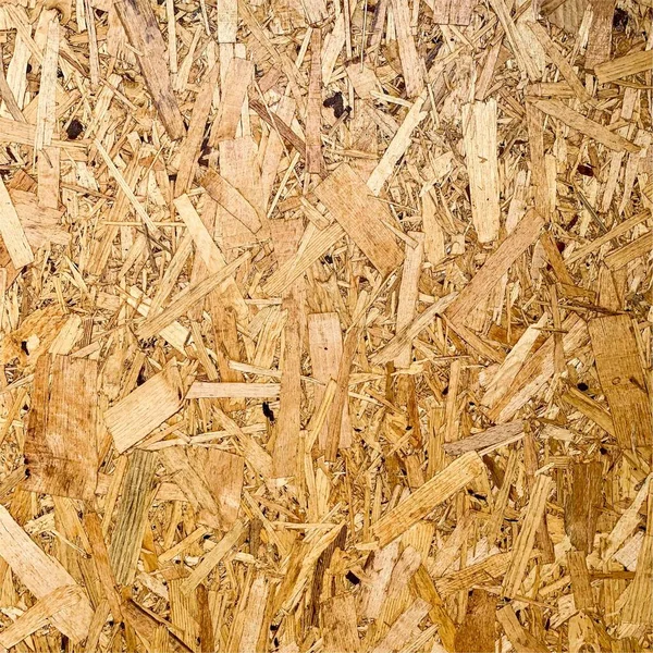 Sıkıştırılmış yonga arka planı. Ahşap zemin. OSB dokusu
