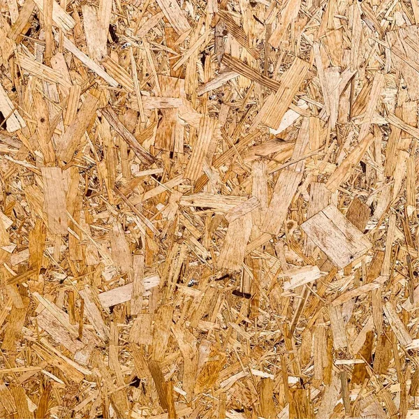 Sıkıştırılmış yonga arka planı. Ahşap zemin. OSB dokusu
