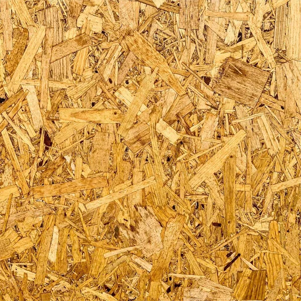 Sıkıştırılmış yonga arka planı. Ahşap zemin. OSB dokusu