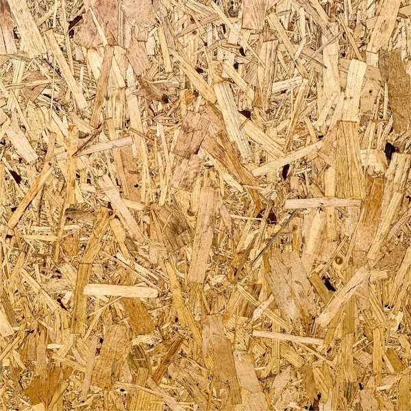 Sıkıştırılmış yonga arka planı. Ahşap zemin. OSB dokusu