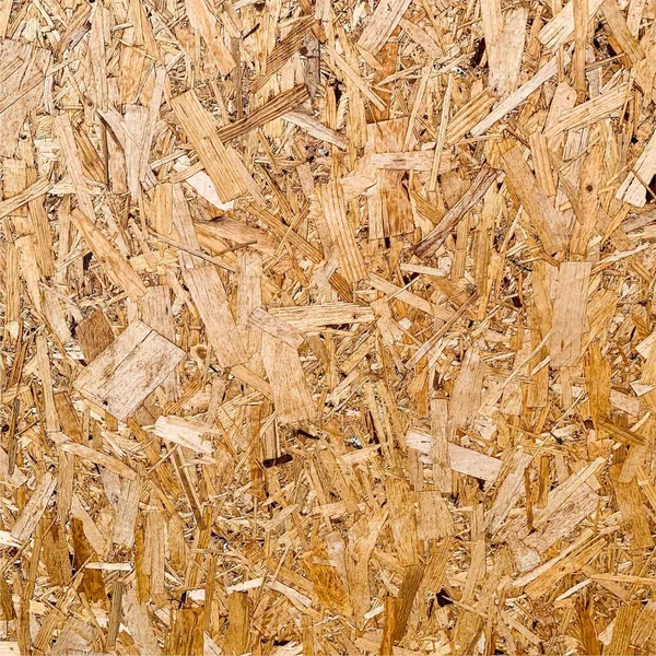 Sıkıştırılmış yonga arka planı. Ahşap zemin. OSB dokusu