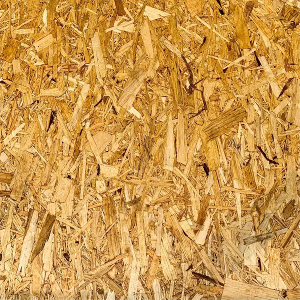 Sıkıştırılmış yonga arka planı. Ahşap zemin. OSB dokusu