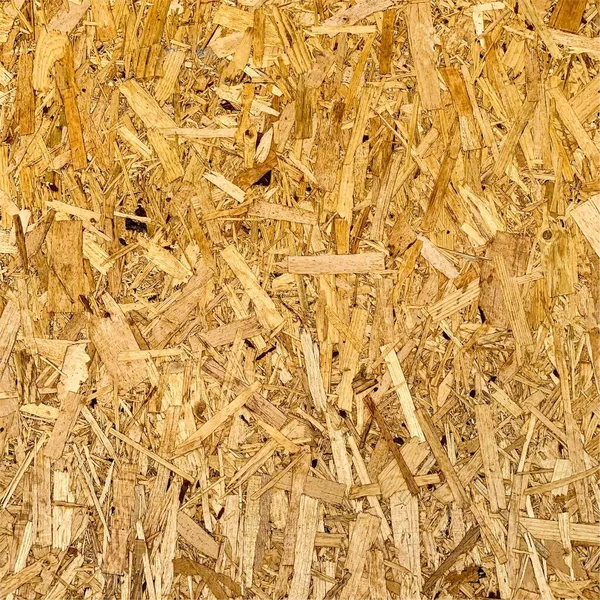 Sıkıştırılmış yonga arka planı. Ahşap zemin. OSB dokusu