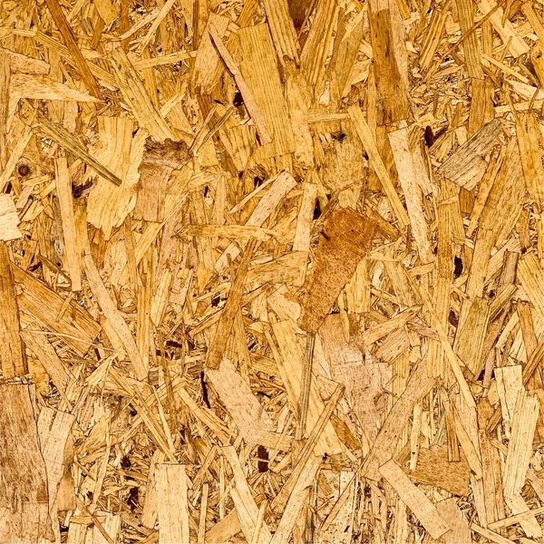 Sıkıştırılmış yonga arka planı. Ahşap zemin. OSB dokusu