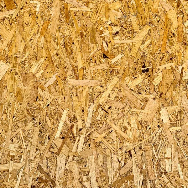 Sıkıştırılmış yonga arka planı. Ahşap zemin. OSB dokusu