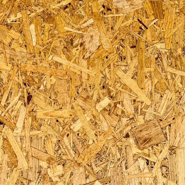Sıkıştırılmış yonga arka planı. Ahşap zemin. OSB dokusu
