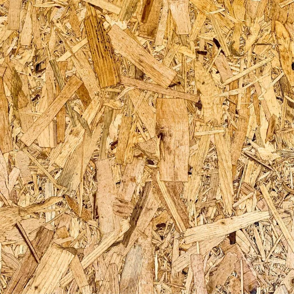 Sıkıştırılmış yonga arka planı. Ahşap zemin. OSB dokusu